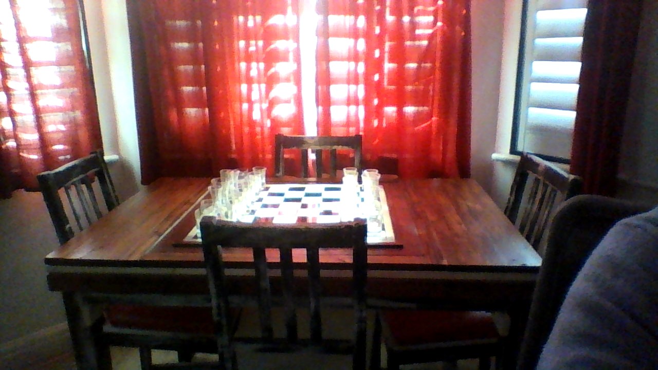 Solid wood gaming table with LED lit glass chess board.